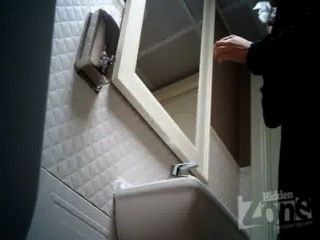 Hidden Camera In The Toilet Of A Bar.